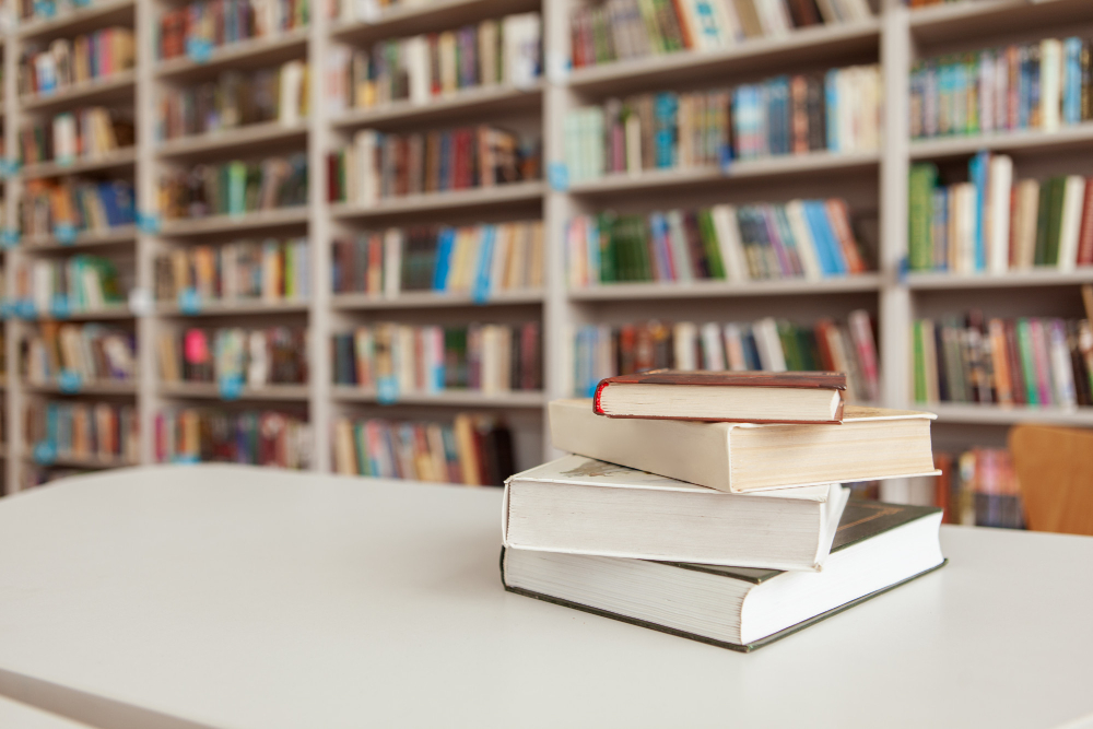 pile books table library